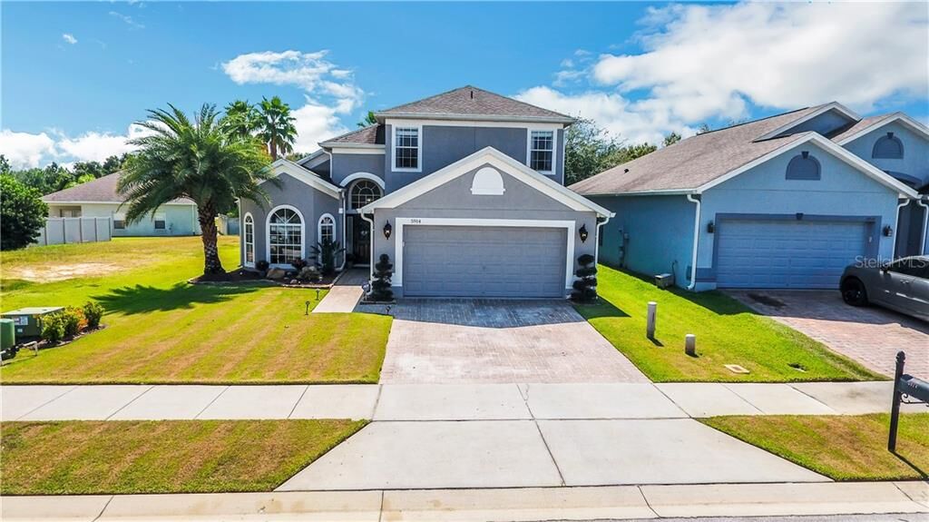 Property Photo:  5914 Whisper Pine Drive  FL 34748 