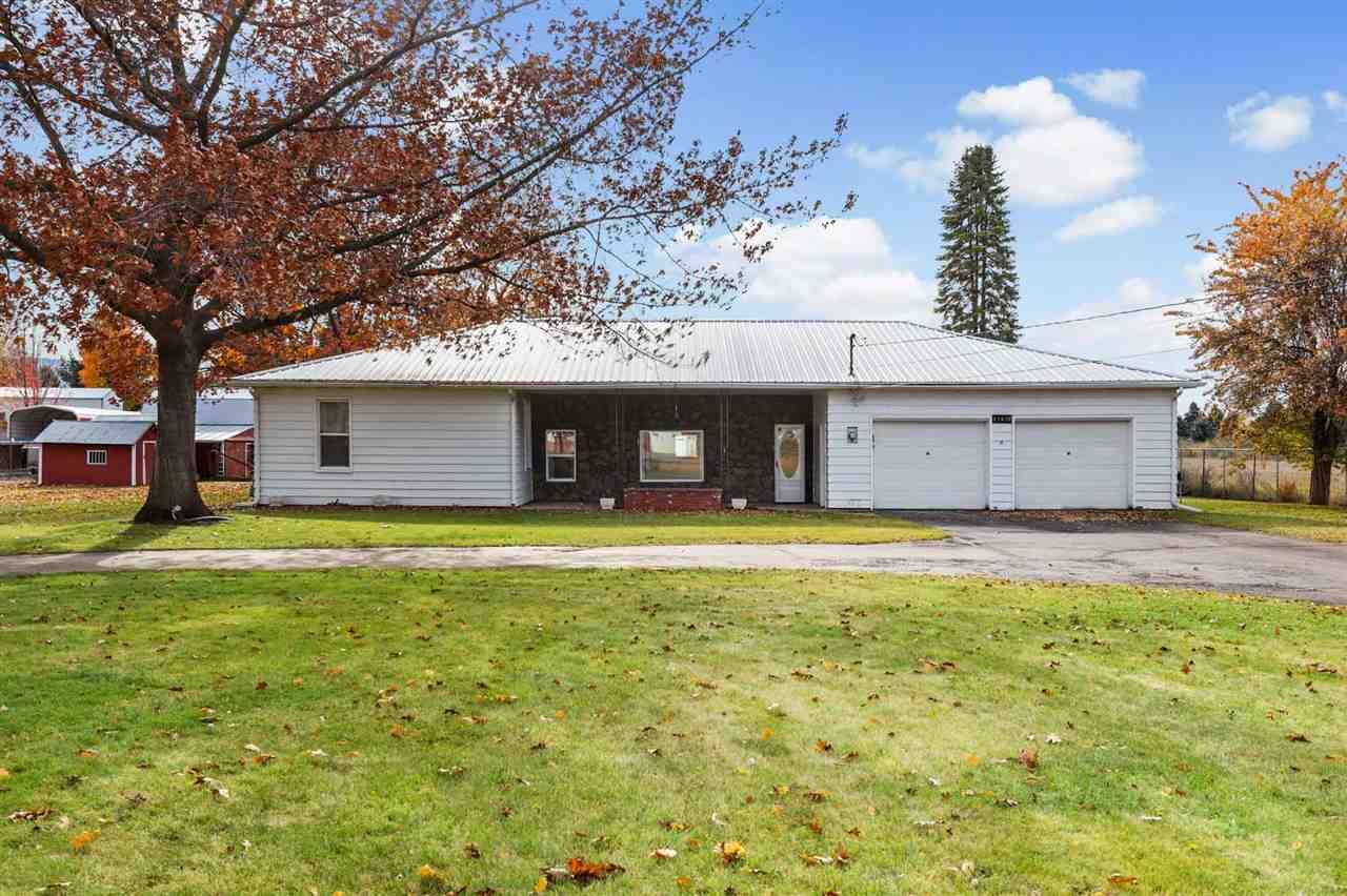 Property Photo: 23618 E Wellesley Ave WA 99027