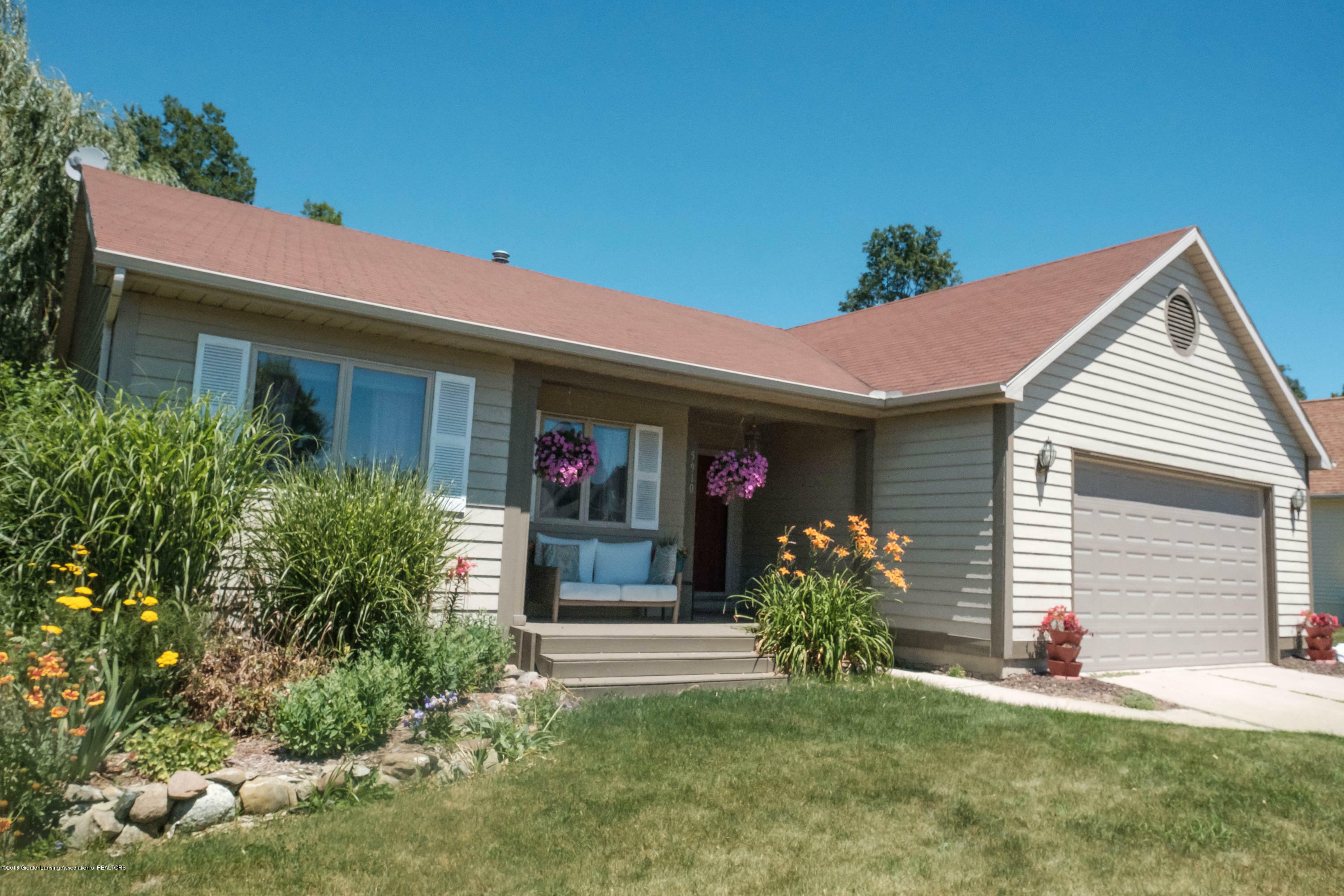 Property Photo:  5910 Cartago Drive  MI 48911 