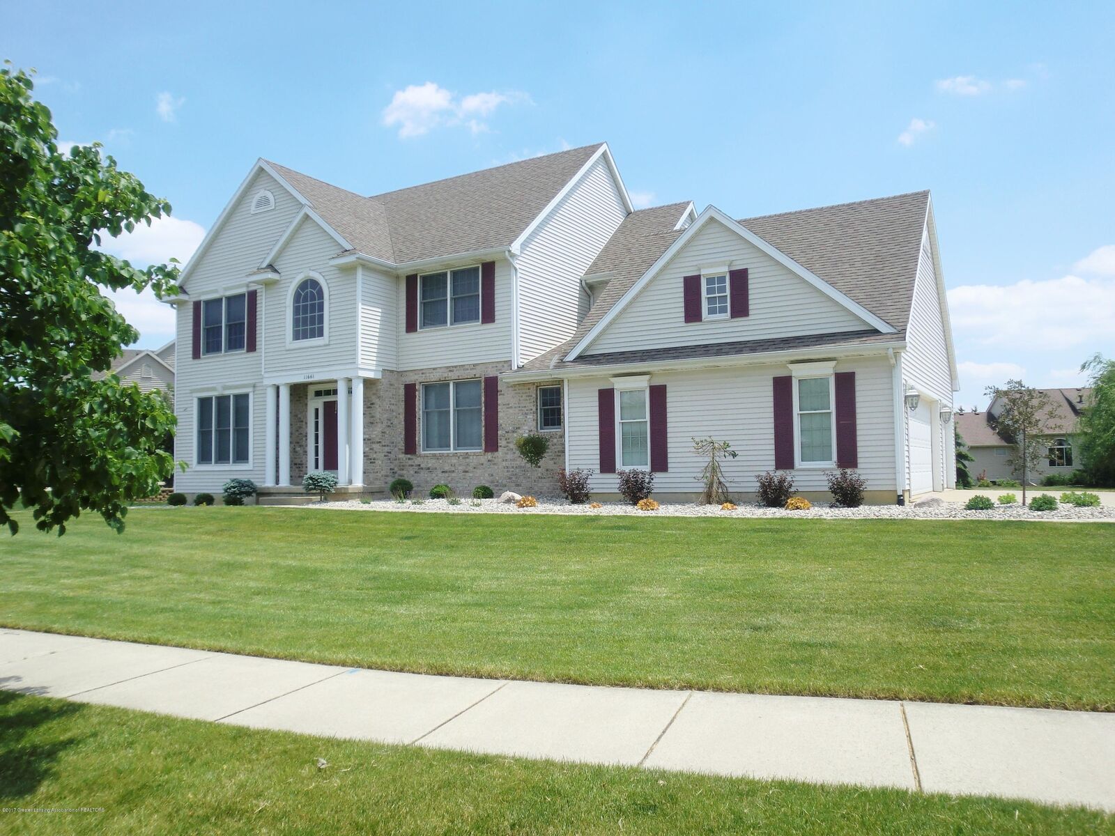 Property Photo:  11661 Hidden Ridge Drive  MI 48820 