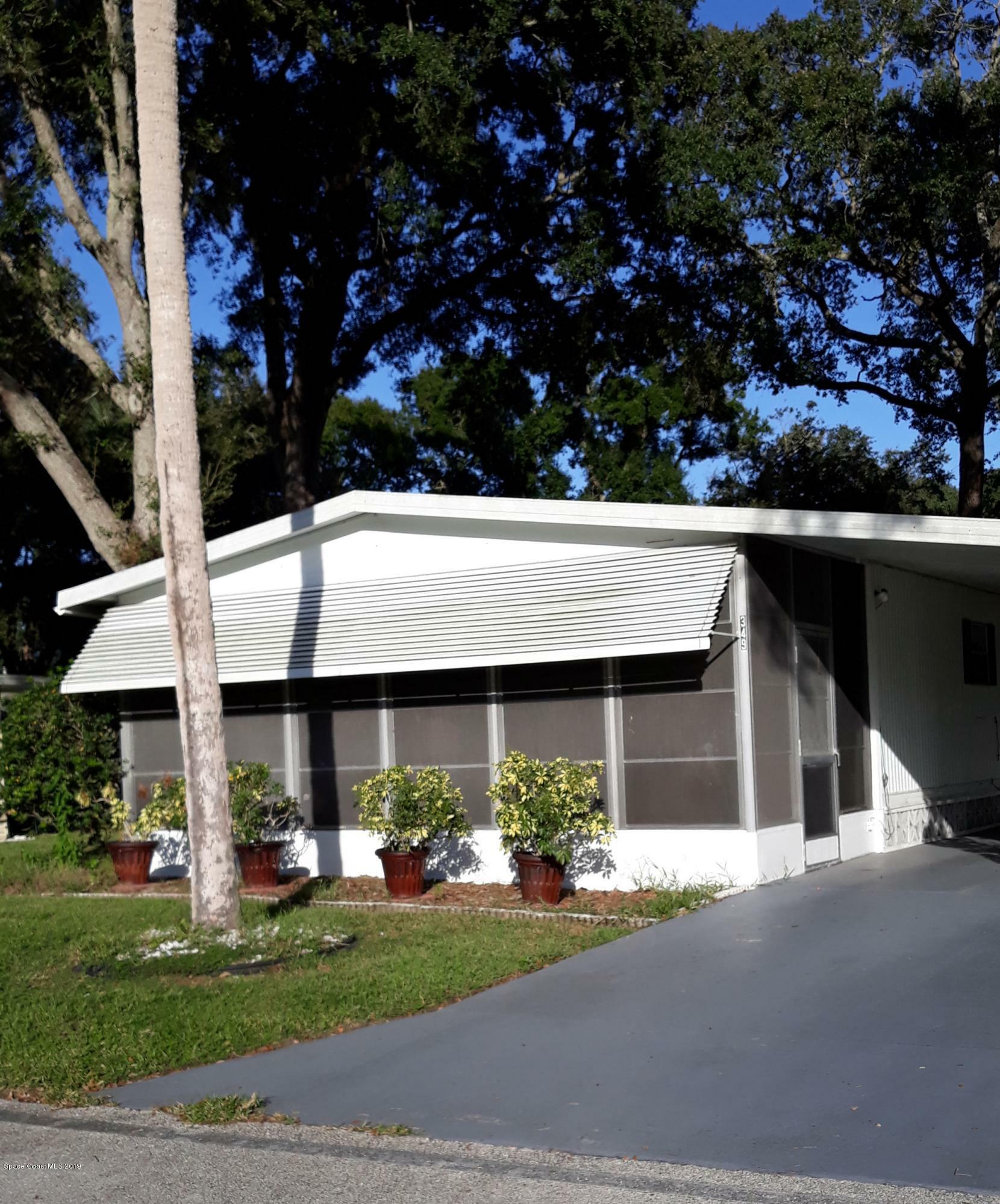 Property Photo:  349 NE Holiday Park Boulevard NE  FL 32907 