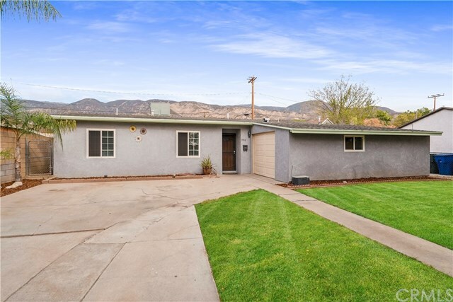 Property Photo:  396 W 48th Street  CA 92407 