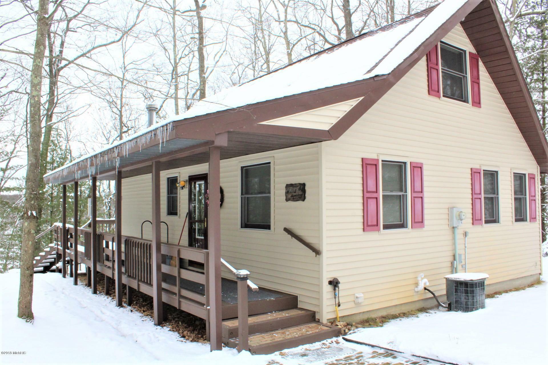 Property Photo:  9284 S Oxeye Avenue  MI 49304 