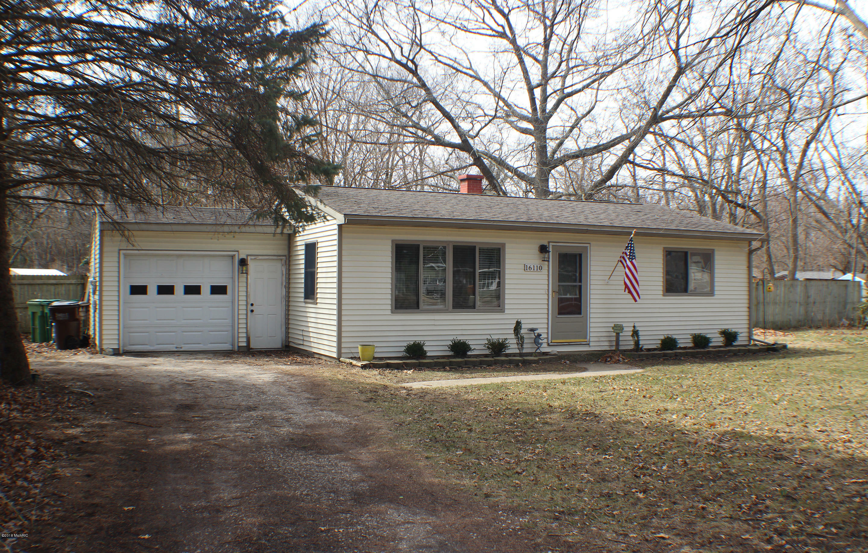 Property Photo:  16110 Mercury Drive  MI 49417 