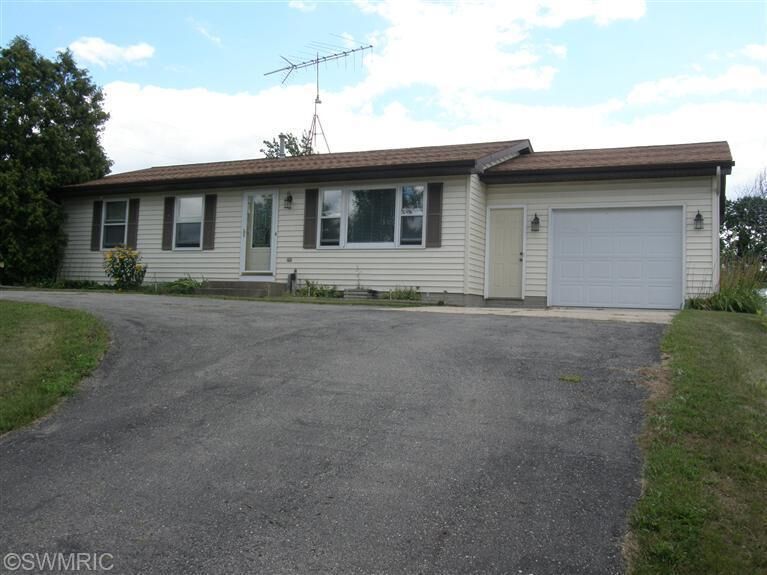 Property Photo:  210 Broman Street NE  MI 49345 