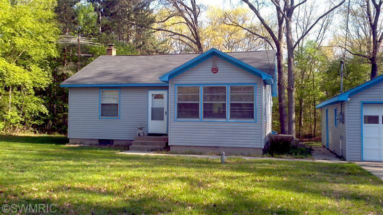 Property Photo:  5704 Heights Ravenna Road  MI 49415 