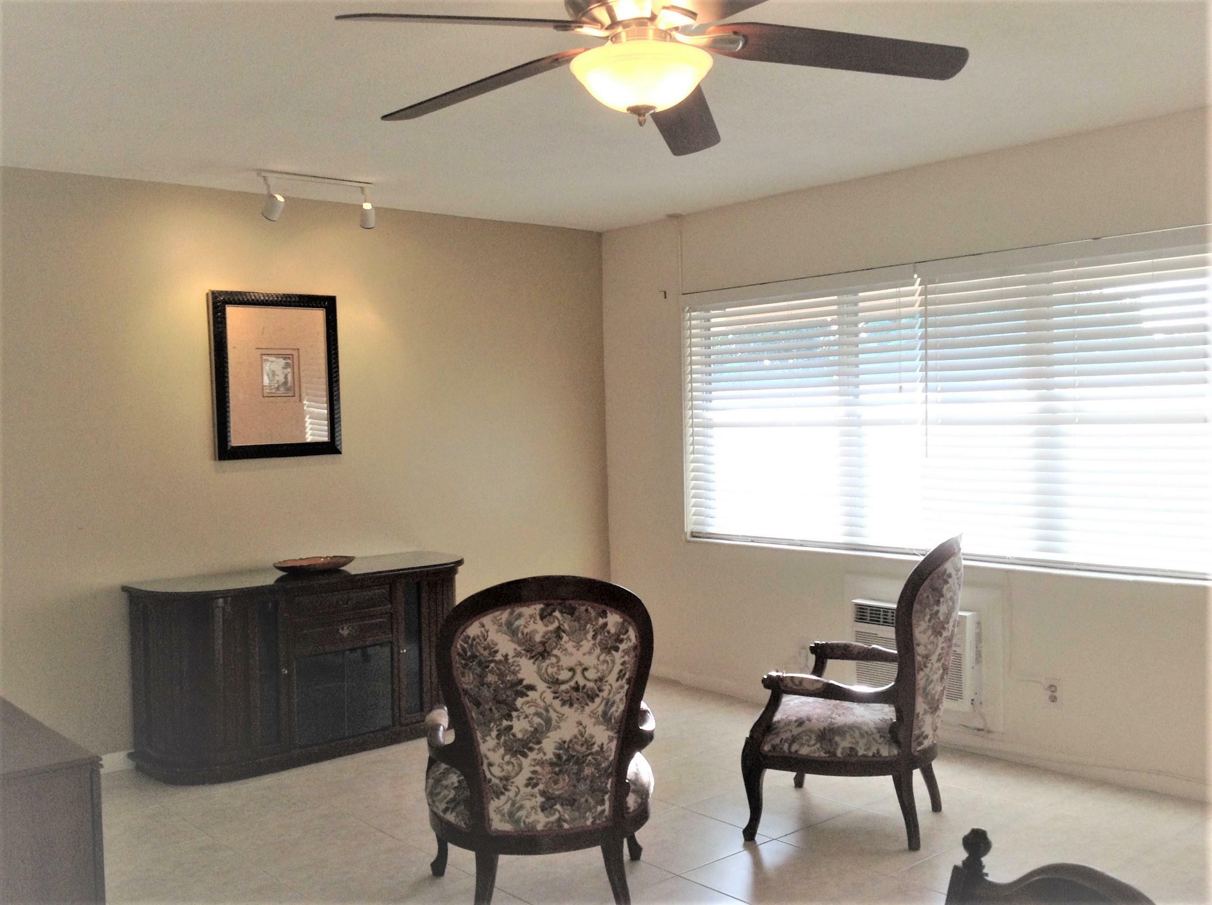 Property Photo:  119 Bedford E  FL 33417 