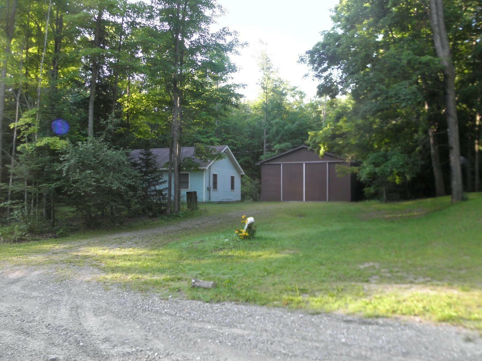 Property Photo:  20253 Six Mile Highway  MI 49765 