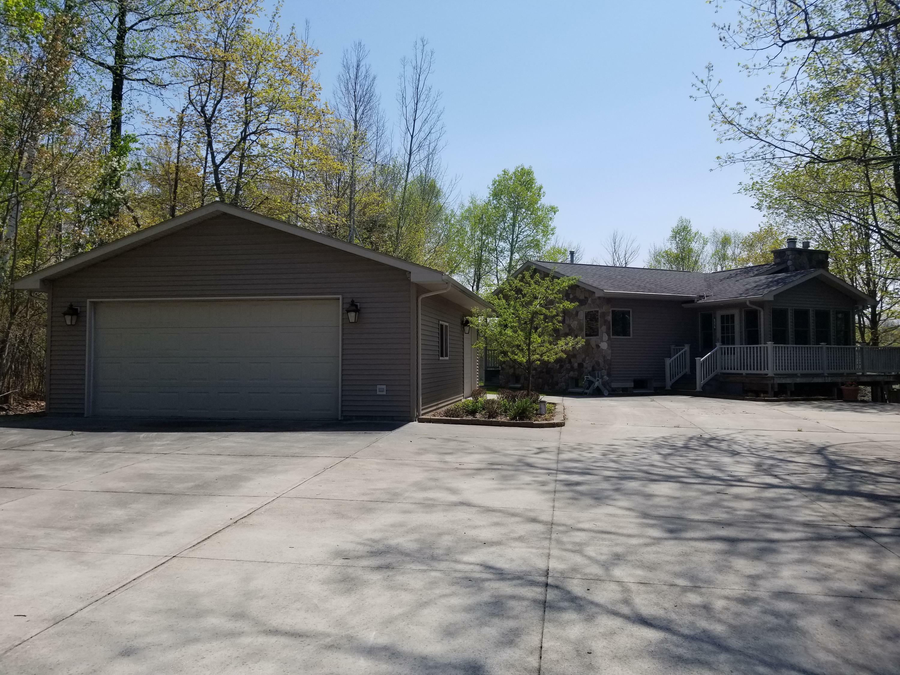 Property Photo:  6376 Silver Rock Highway  MI 49759 