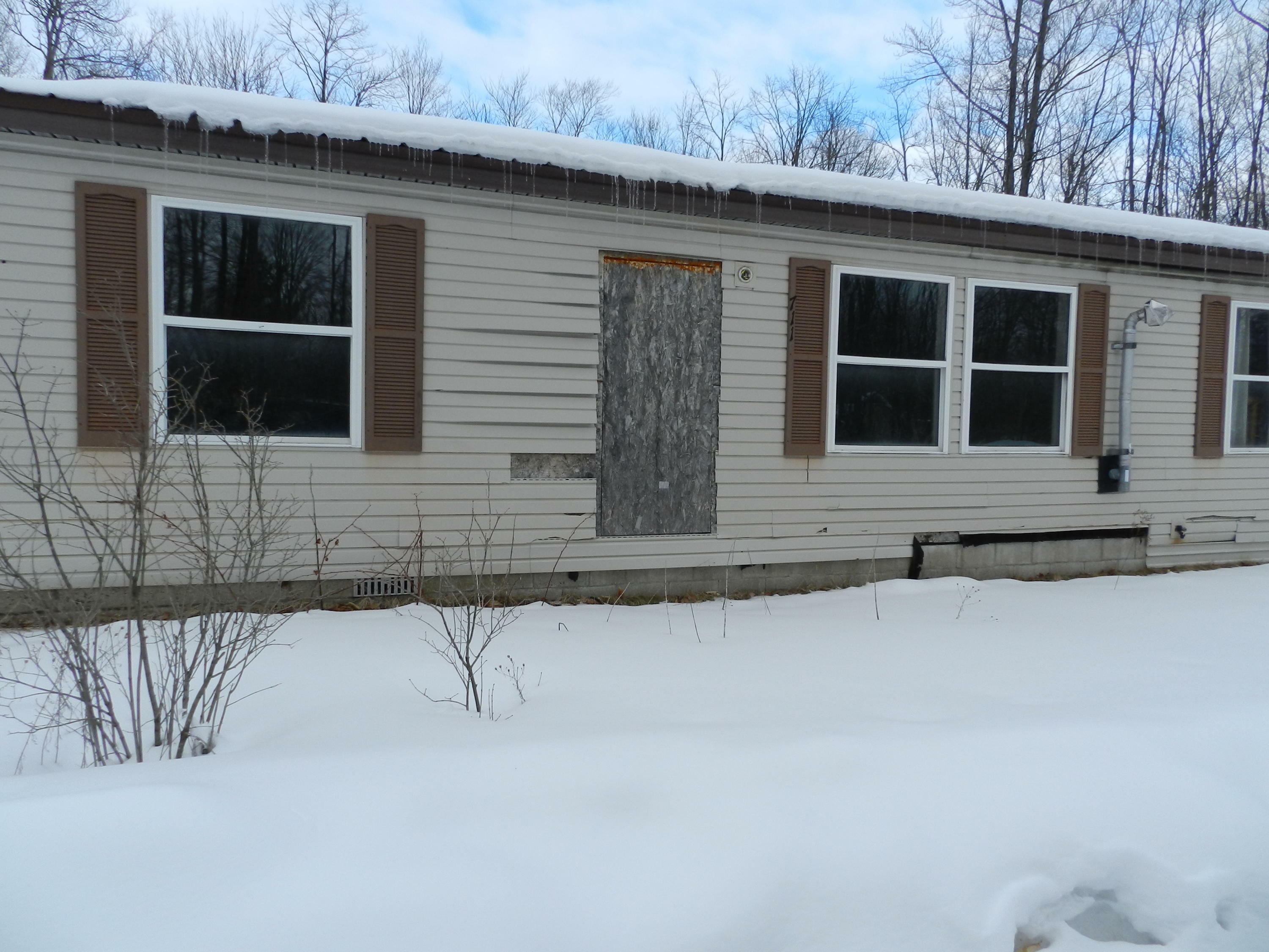 Property Photo:  7112 Brudy Lane  MI 49749 