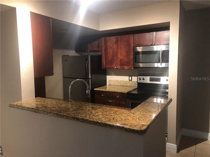 Property Photo:  5100 Conroy Road 112  FL 32811