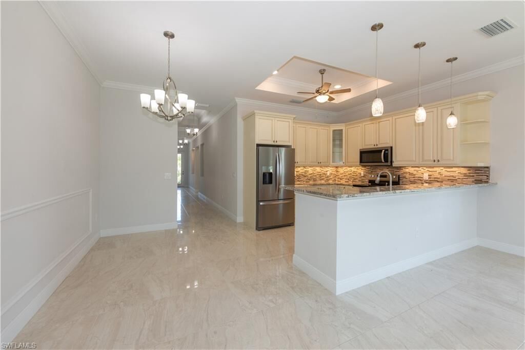 Property Photo:  698 103rd Ave  FL 34108 