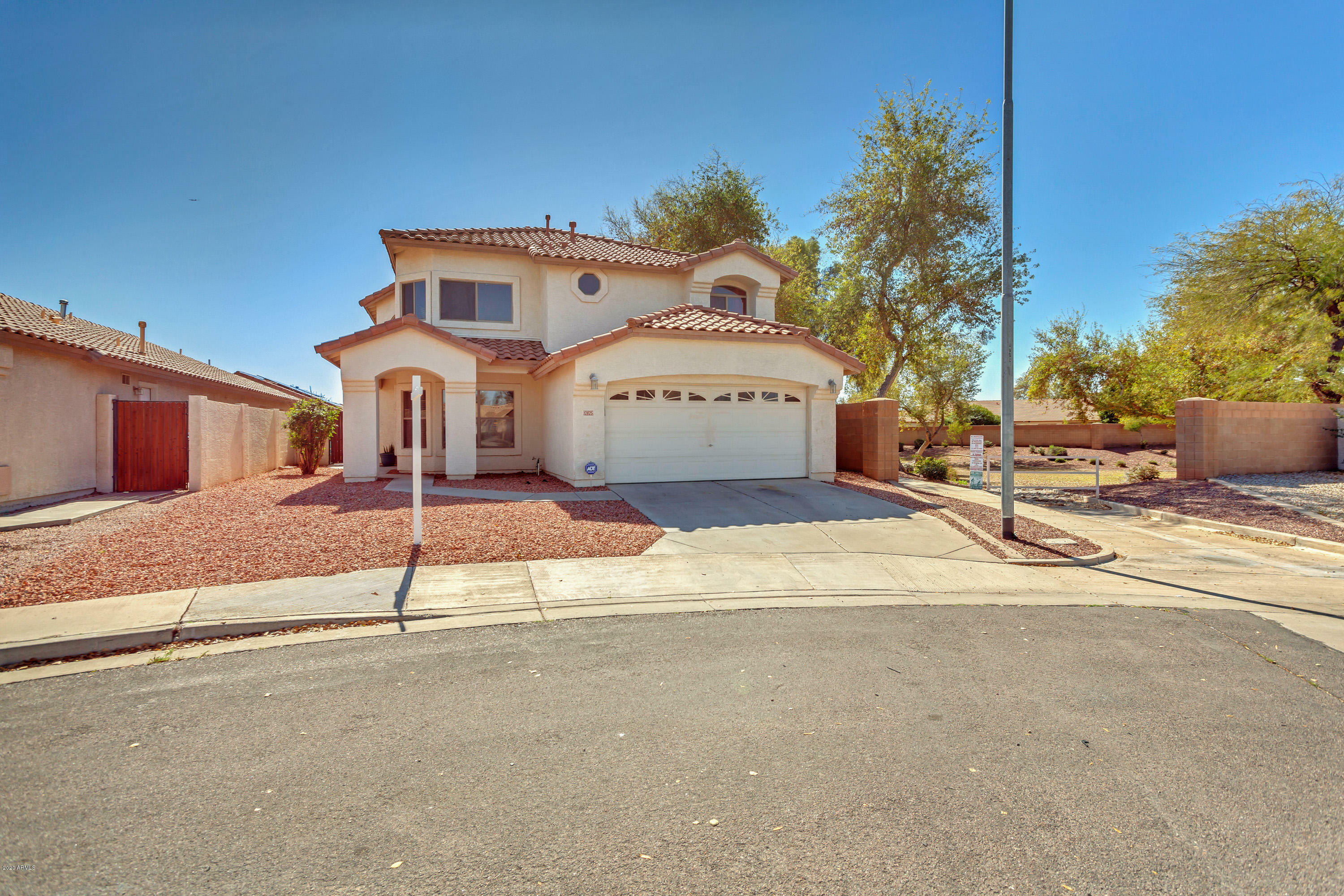 Property Photo:  12825 W Palm Lane  AZ 85392 