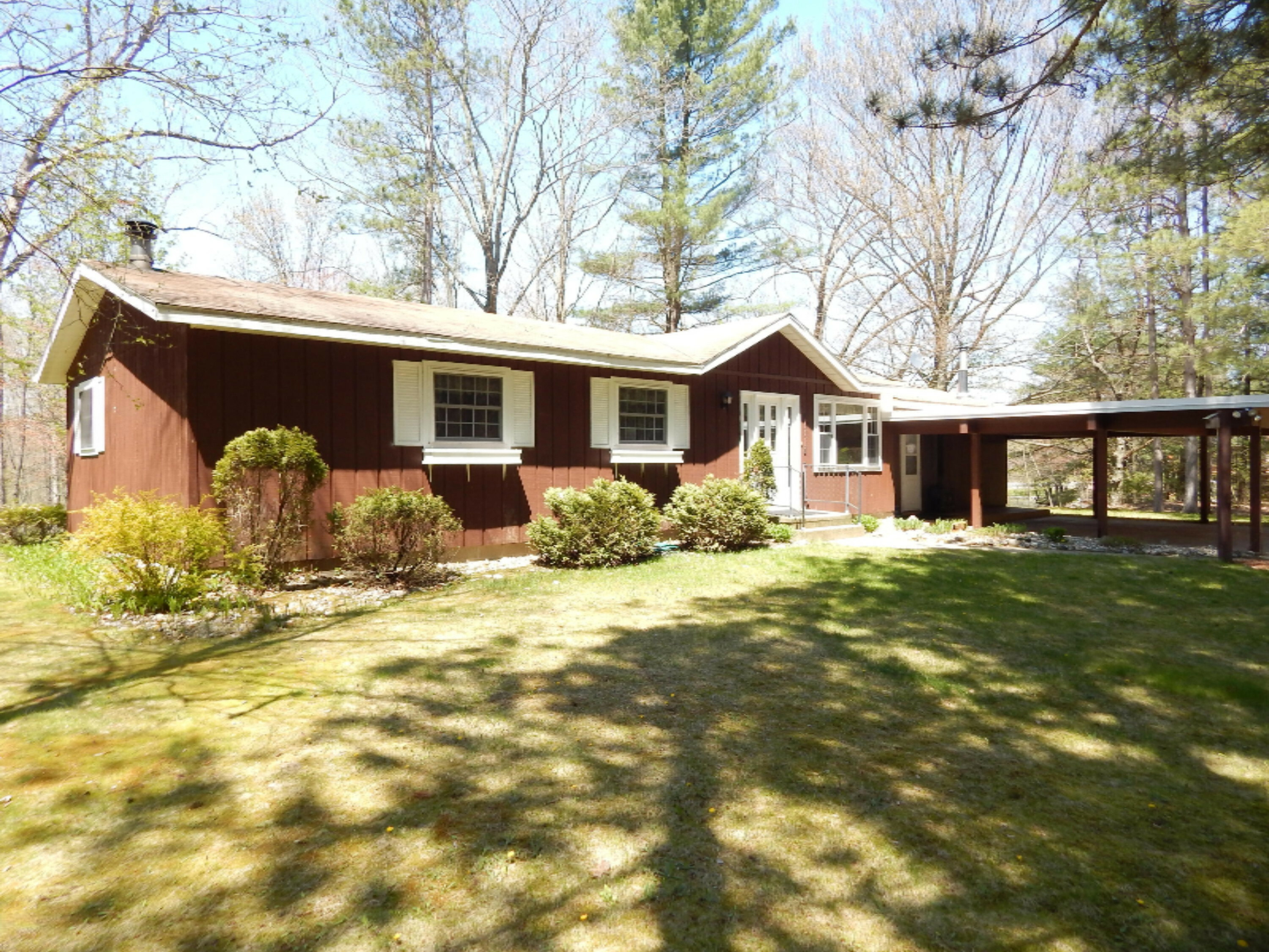 Property Photo:  310 17 Mile Road NW  MI 49330 