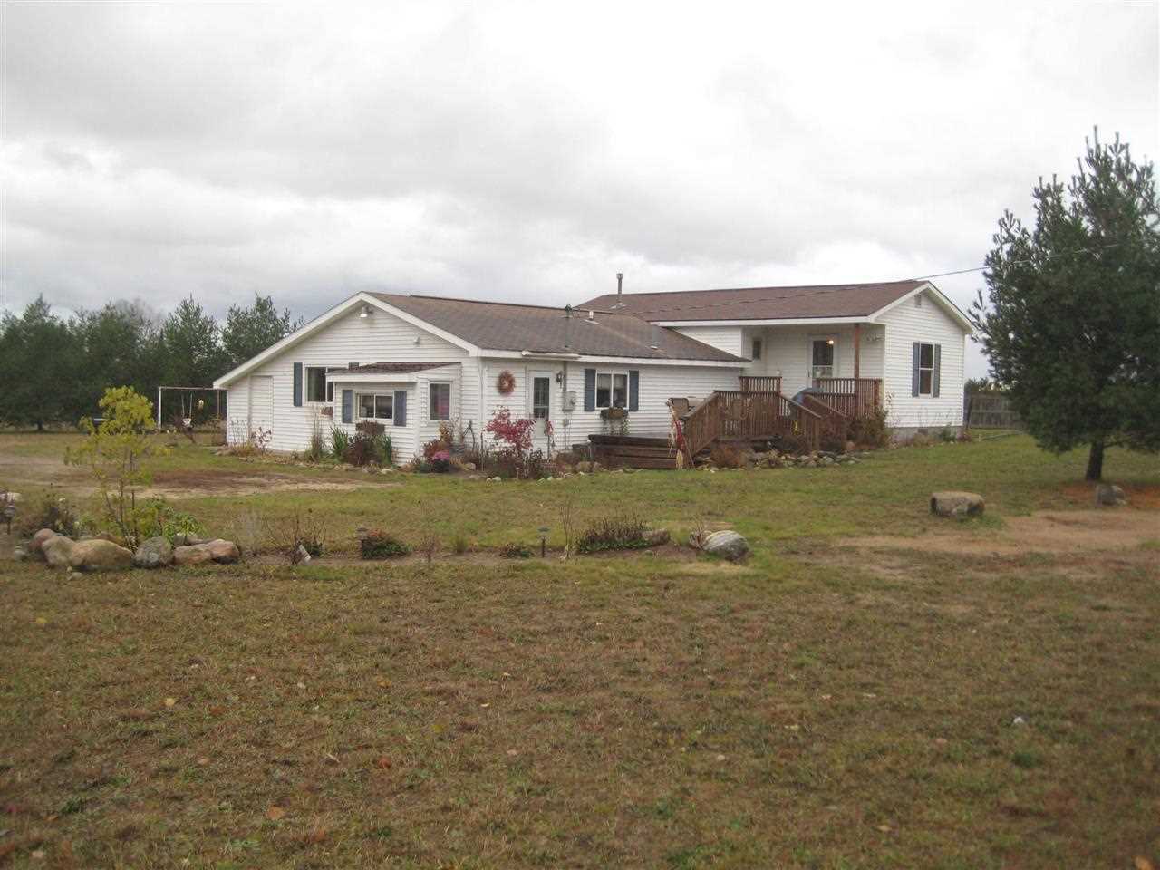 Property Photo:  8707 Coors  MI 49706 