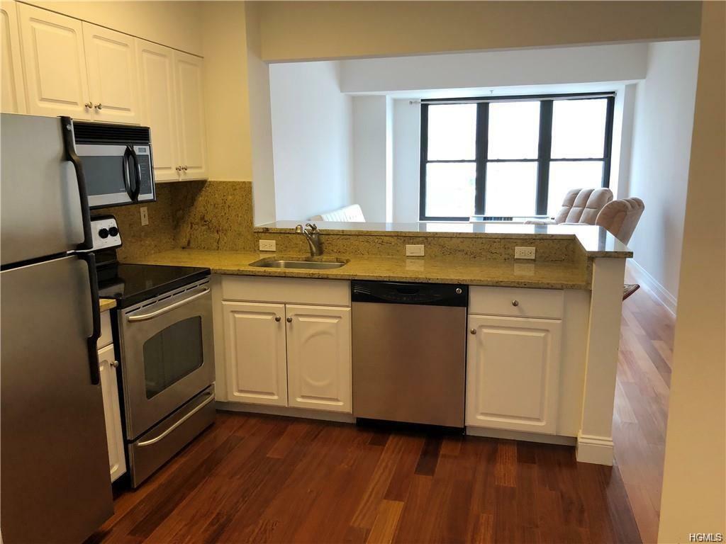 Property Photo:  100 New Roc City 418  NY 10801 