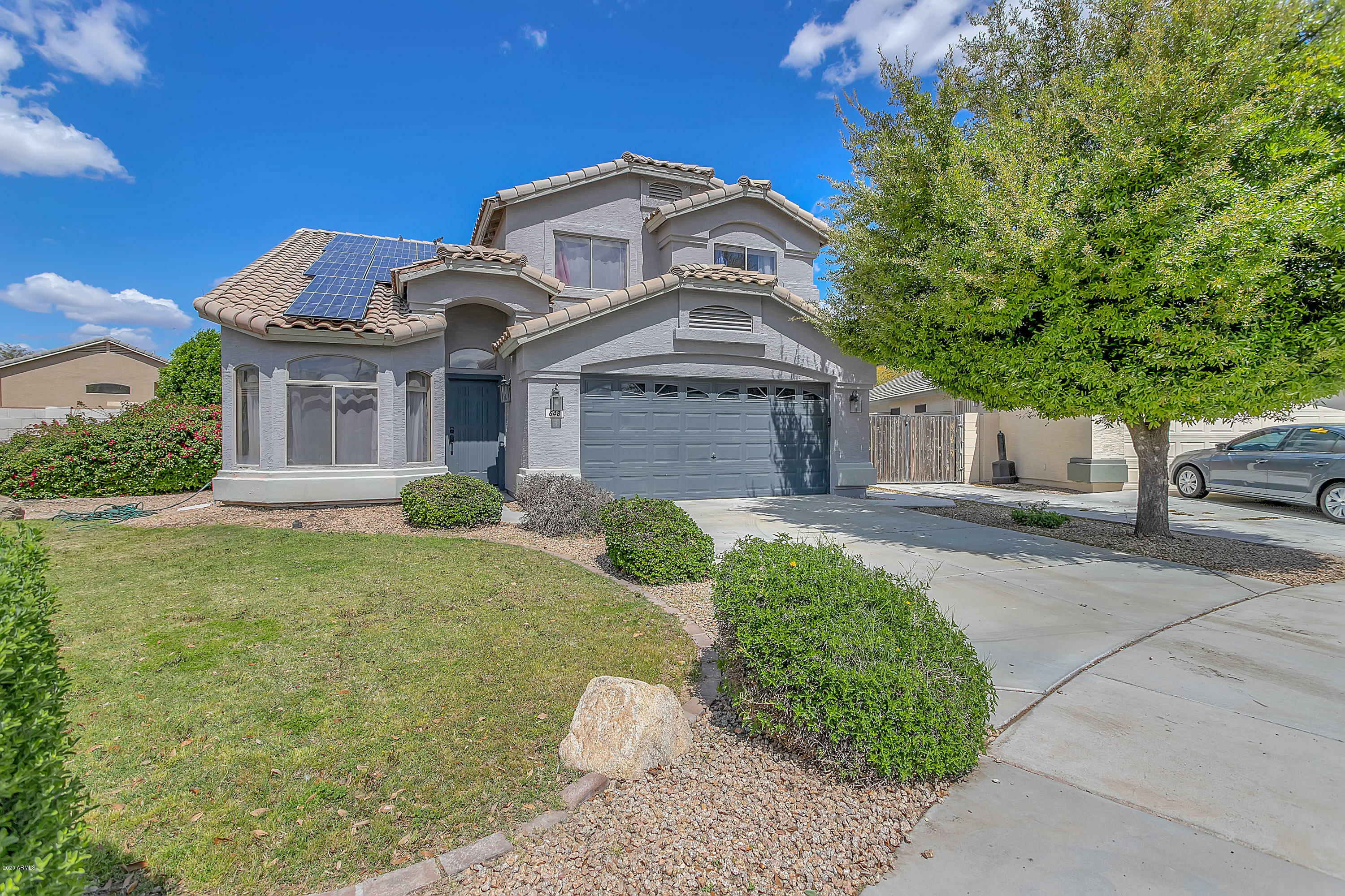 Property Photo:  648 N 167th Drive  AZ 85338 