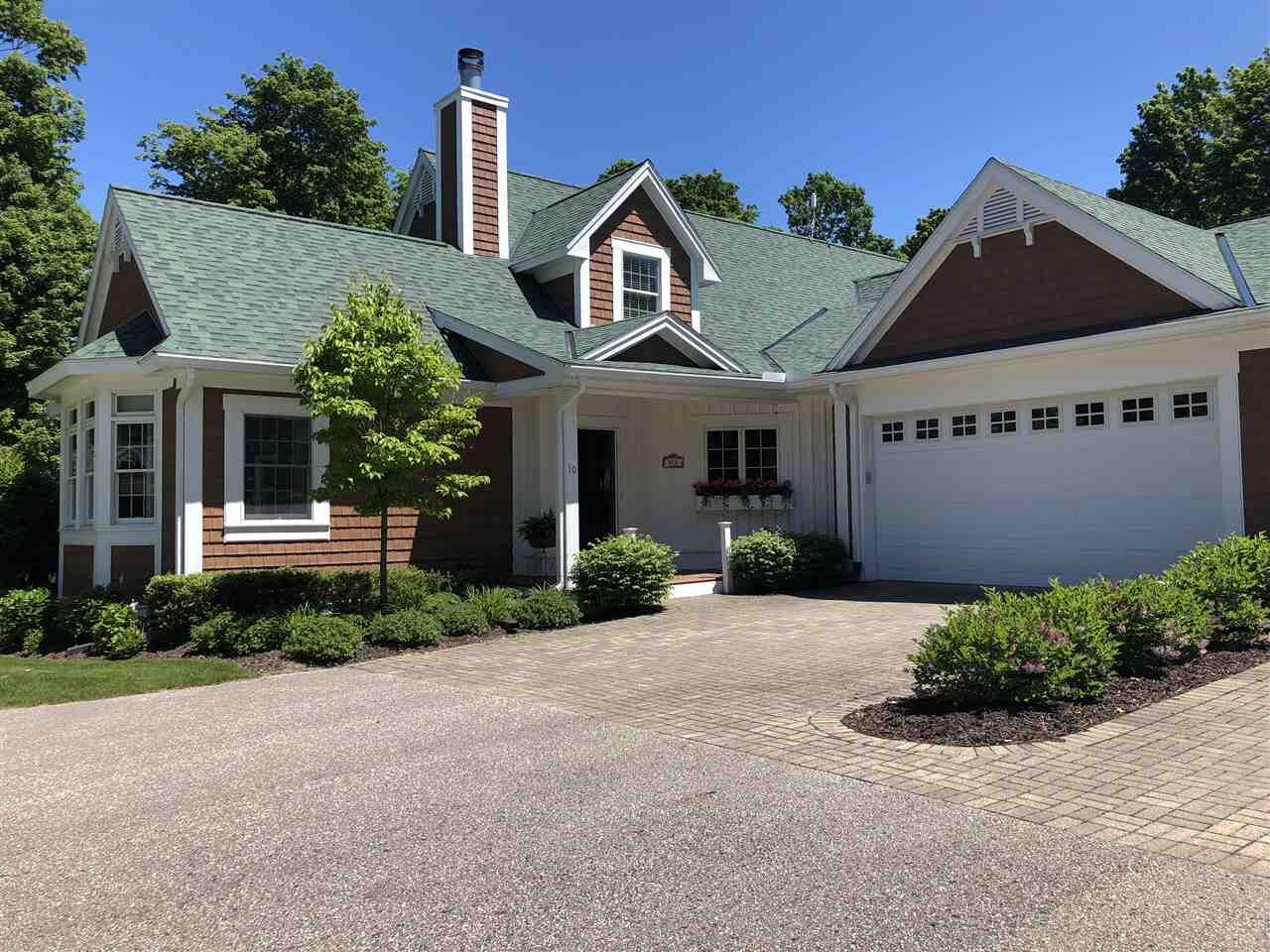 Property Photo:  818 Fairways  MI 49740 