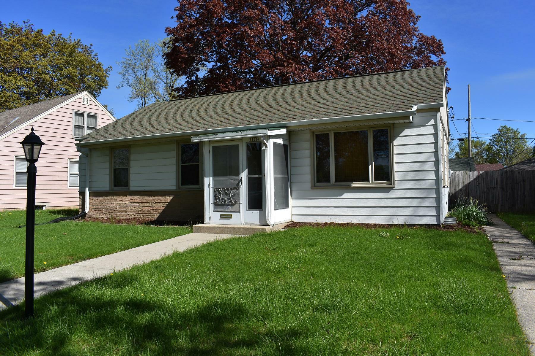 Property Photo:  7166 W Nash St  WI 53216 