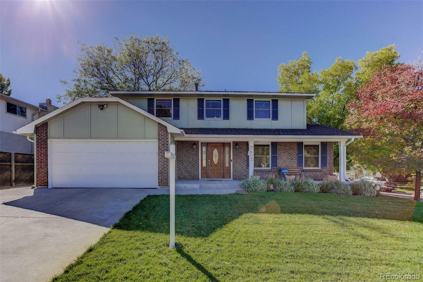 Property Photo: 8602 E Mansfield Avenue CO 80237