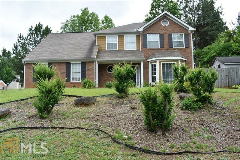 Property Photo:  6900 Magnolia Park Ln  GA 30093 