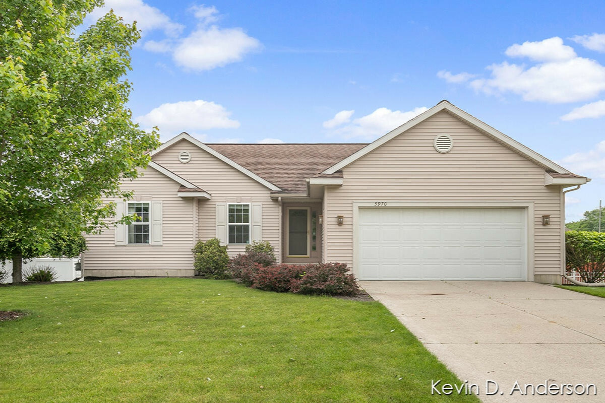 Property Photo:  5970 Tumbleweed Drive SW  MI 49418 