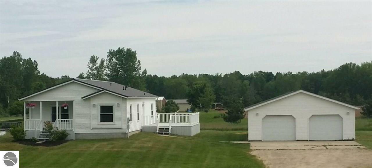 Property Photo:  1448 E Walton Road  MI 48858 