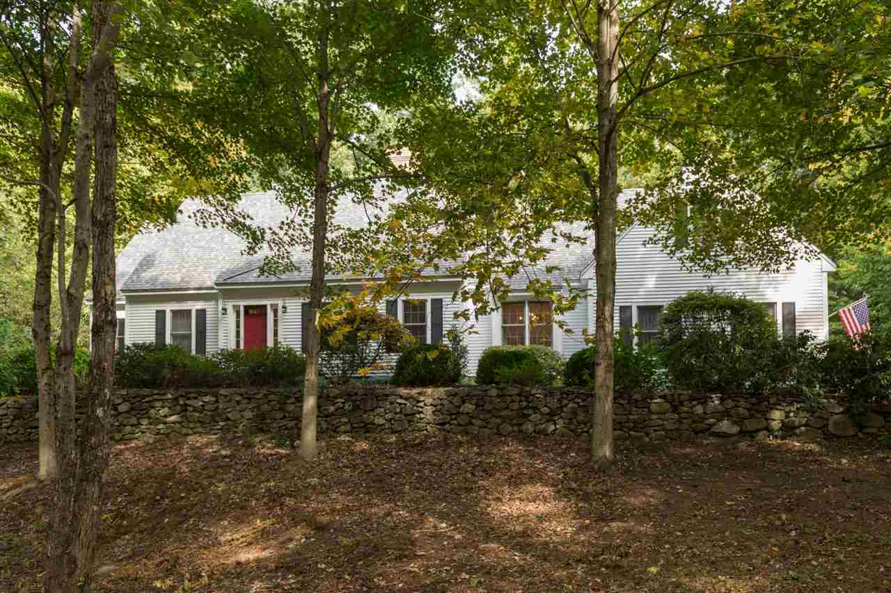 Property Photo: 26 Winding Brook Drive NH 03885