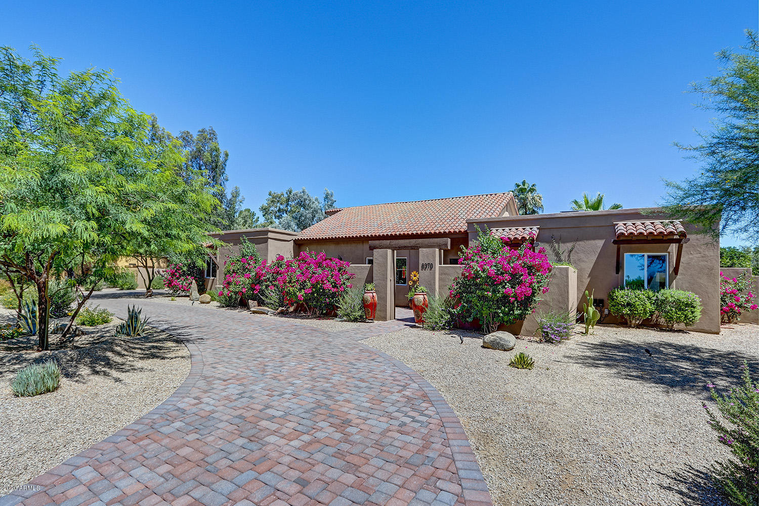 Property Photo: 8370 E Charter Oak Road AZ 85260