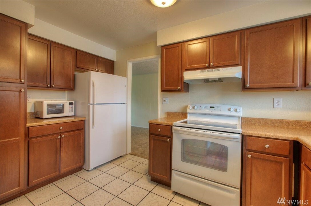 Property Photo:  3425 S 176th St 212  WA 98188 