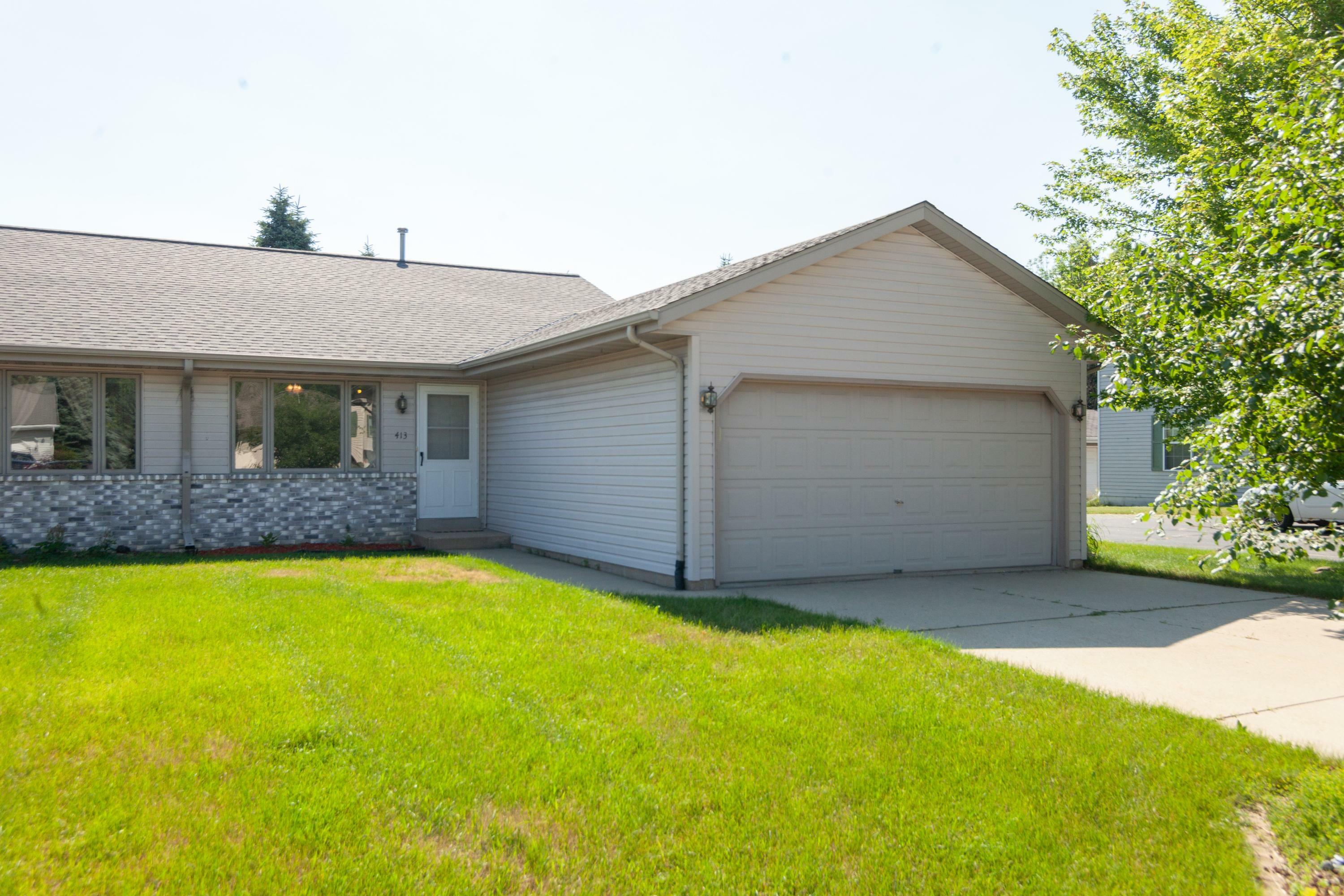 Property Photo:  413 Sheridan Dr  WI 53095 