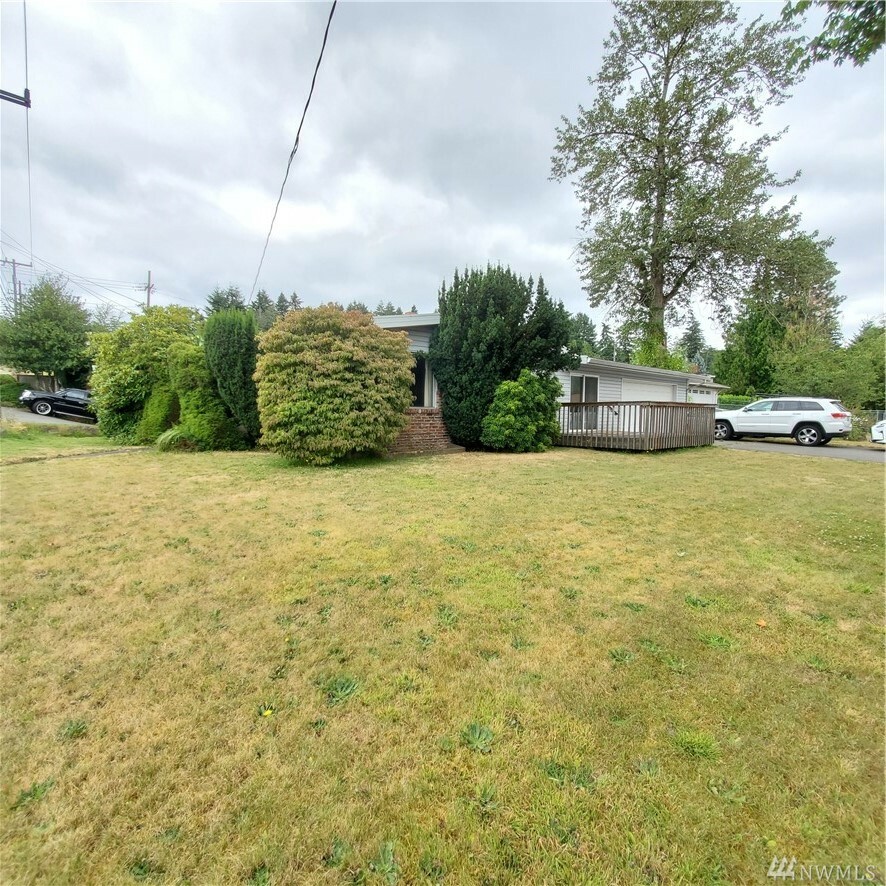 Property Photo:  12710 64th Ave S  WA 98178 