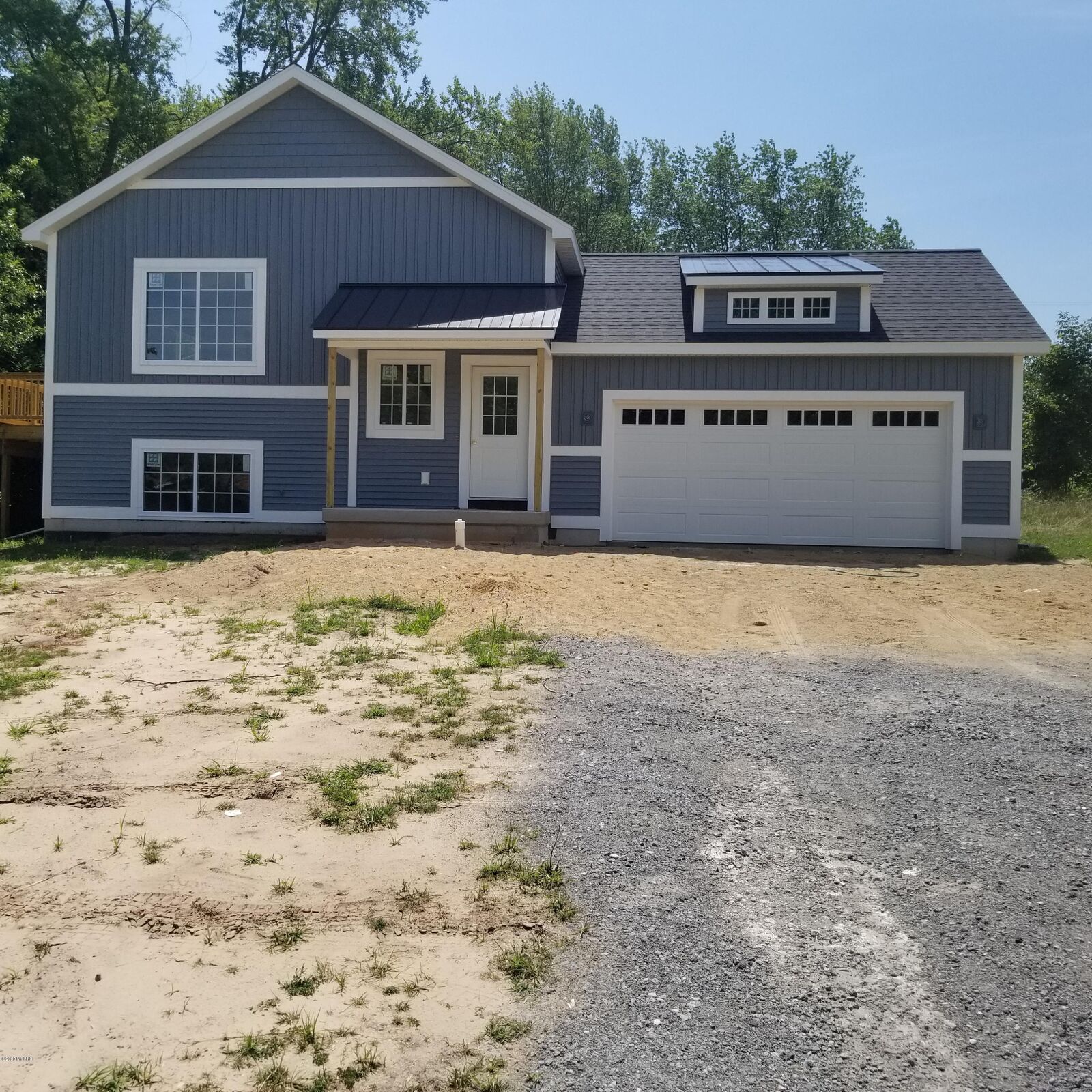 Property Photo:  84 Cleveland Street W  MI 49404 