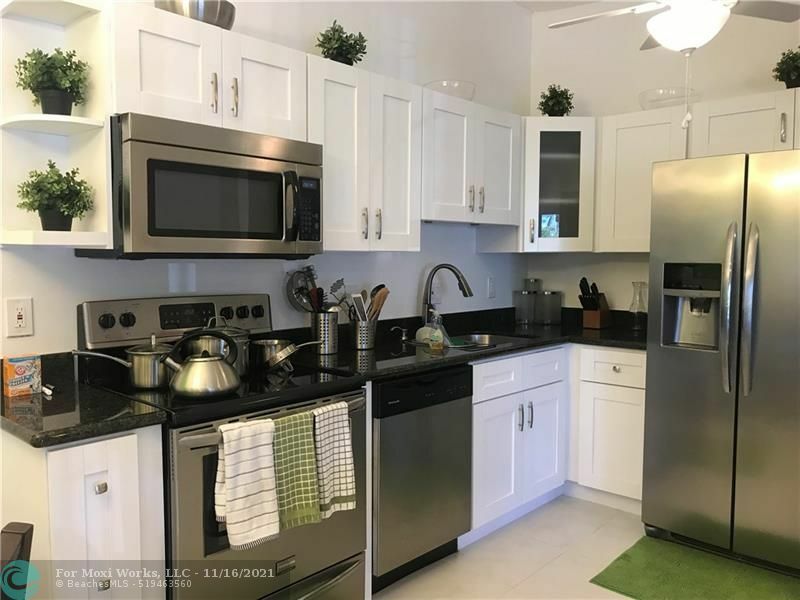 Property Photo:  9604 S Belfort Cir 205  FL 33321 