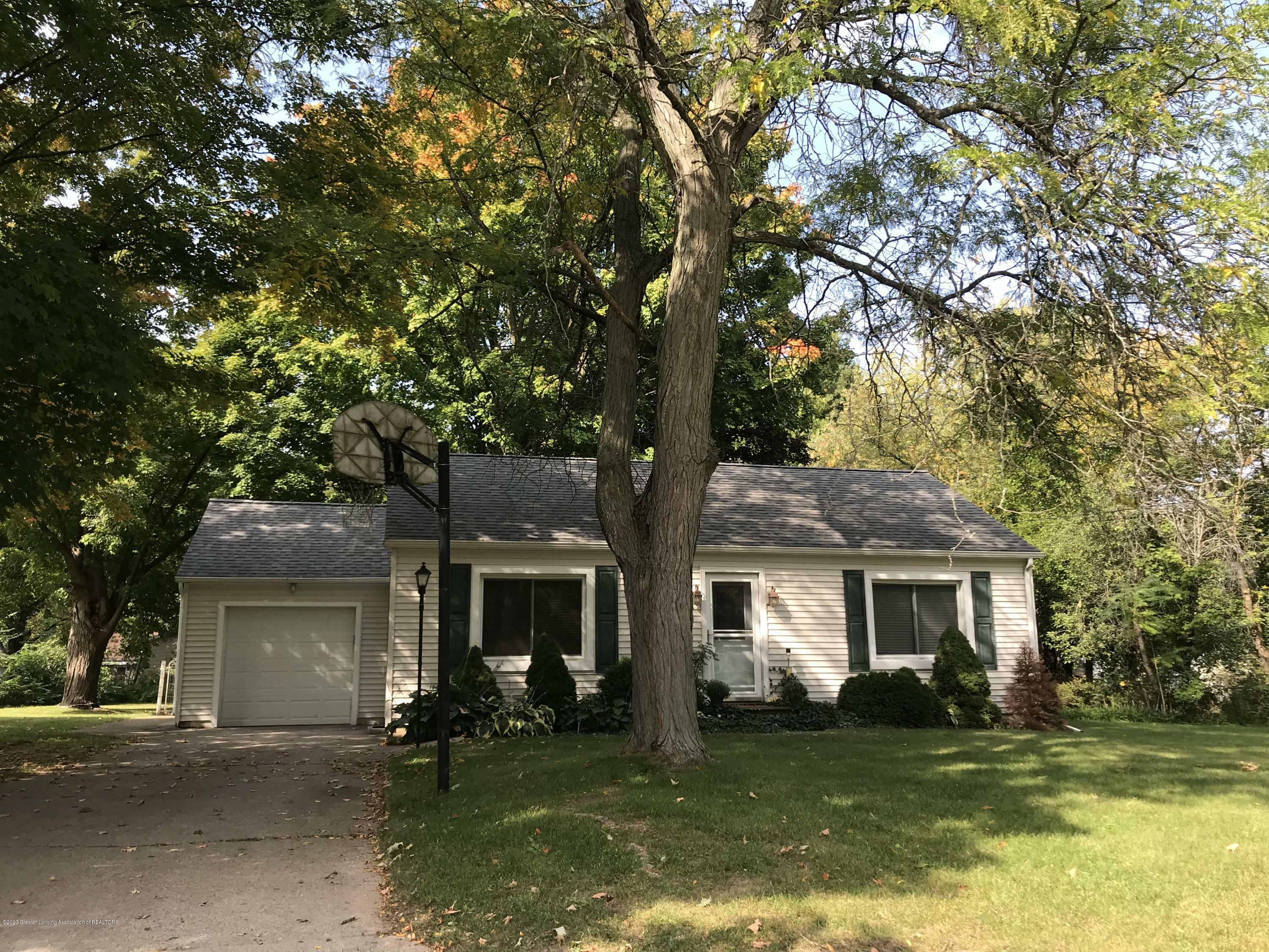 Property Photo:  706 S Bostwick Street  MI 48813 