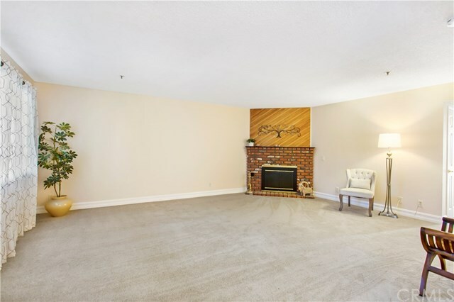 Property Photo:  7715 Newman Avenue 203  CA 92647 