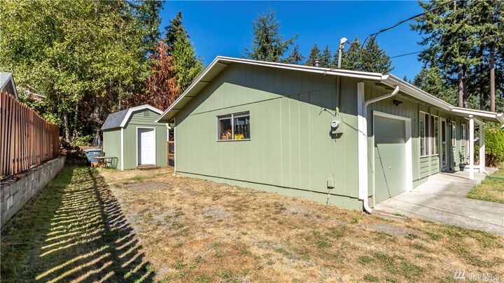 Property Photo:  7011 Locust Ave E  WA 98391 