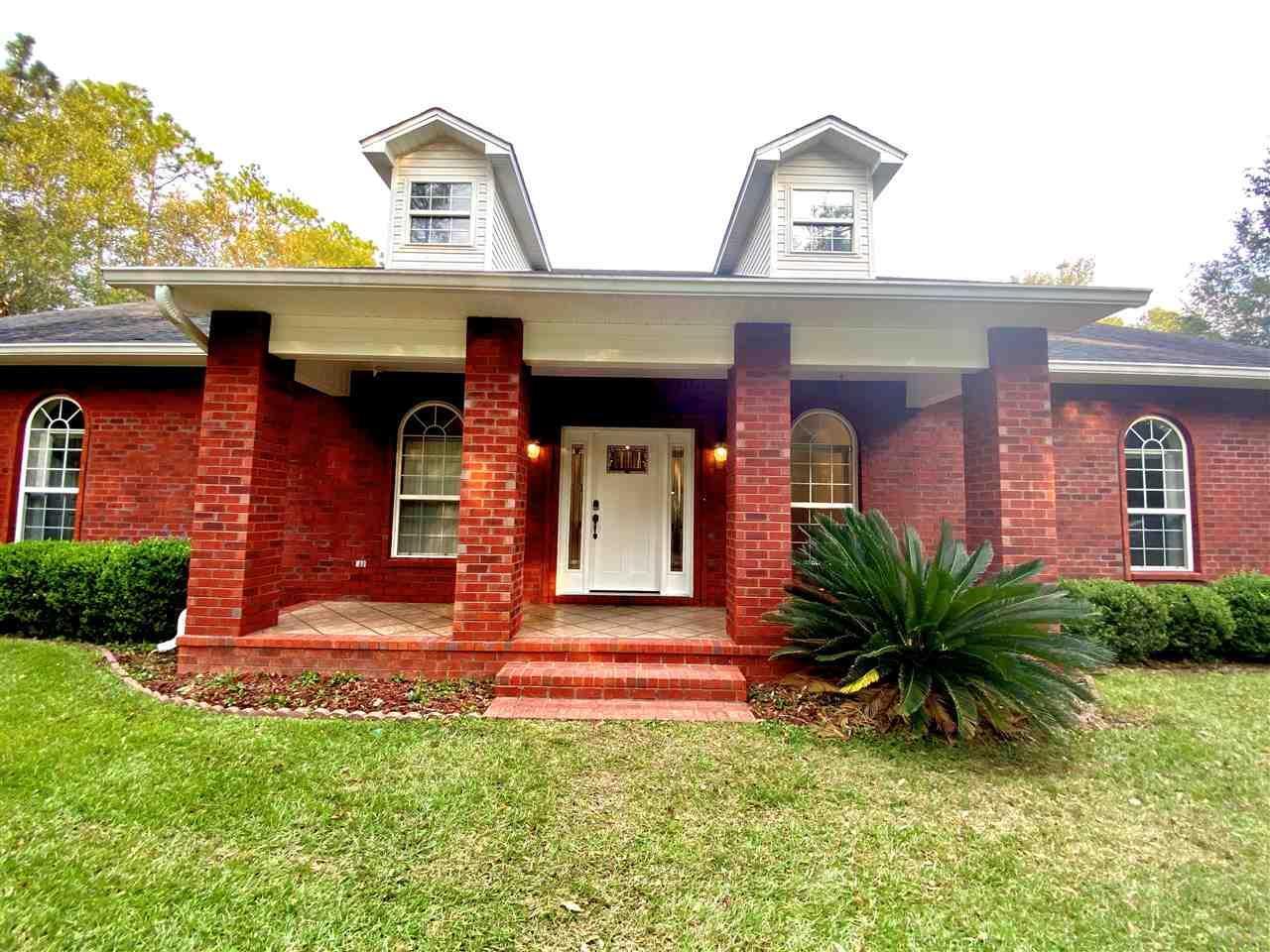 Property Photo: 5910 Anderson Ln FL 32570