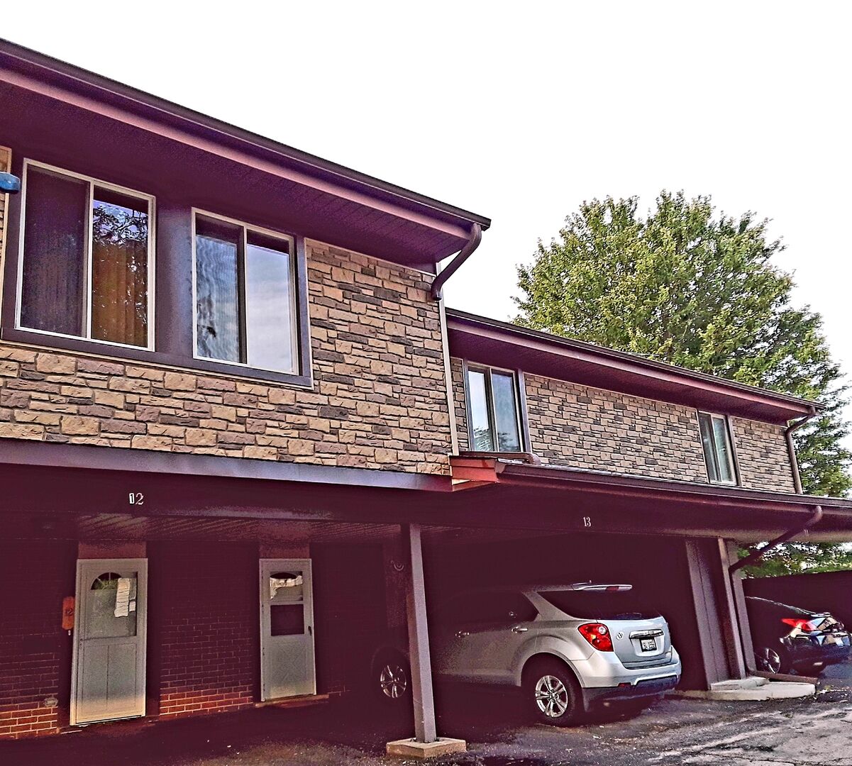 Property Photo:  12 Cour Versaille S  IL 60465 