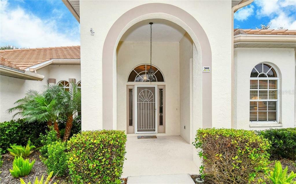 Property Photo:  8482 Cypress Hollow Drive  FL 34238 