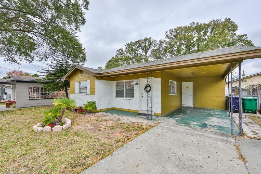 Property Photo:  3703 W Gray Street  FL 33609 