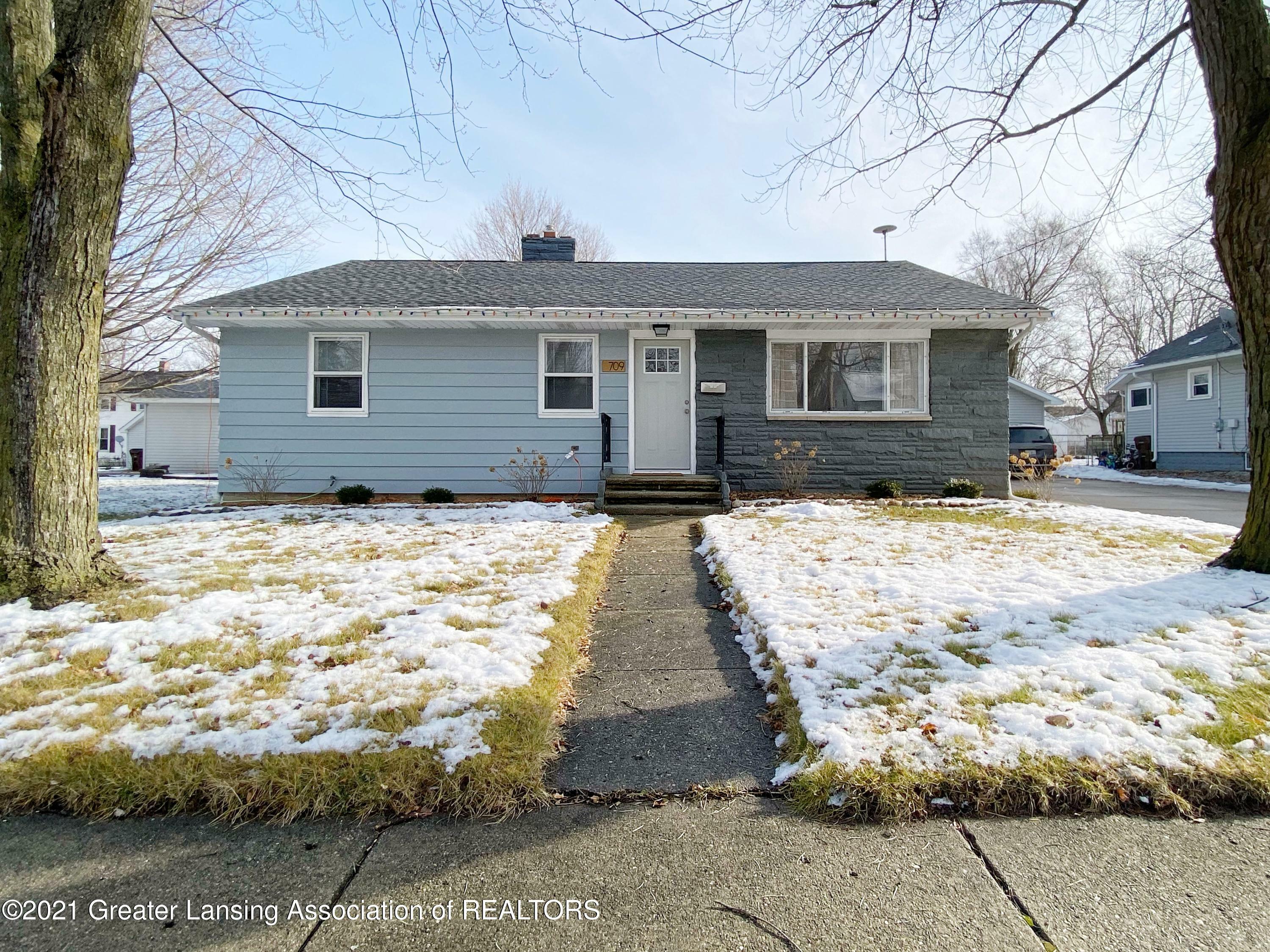 Property Photo:  709 S Cochran Avenue  MI 48813 