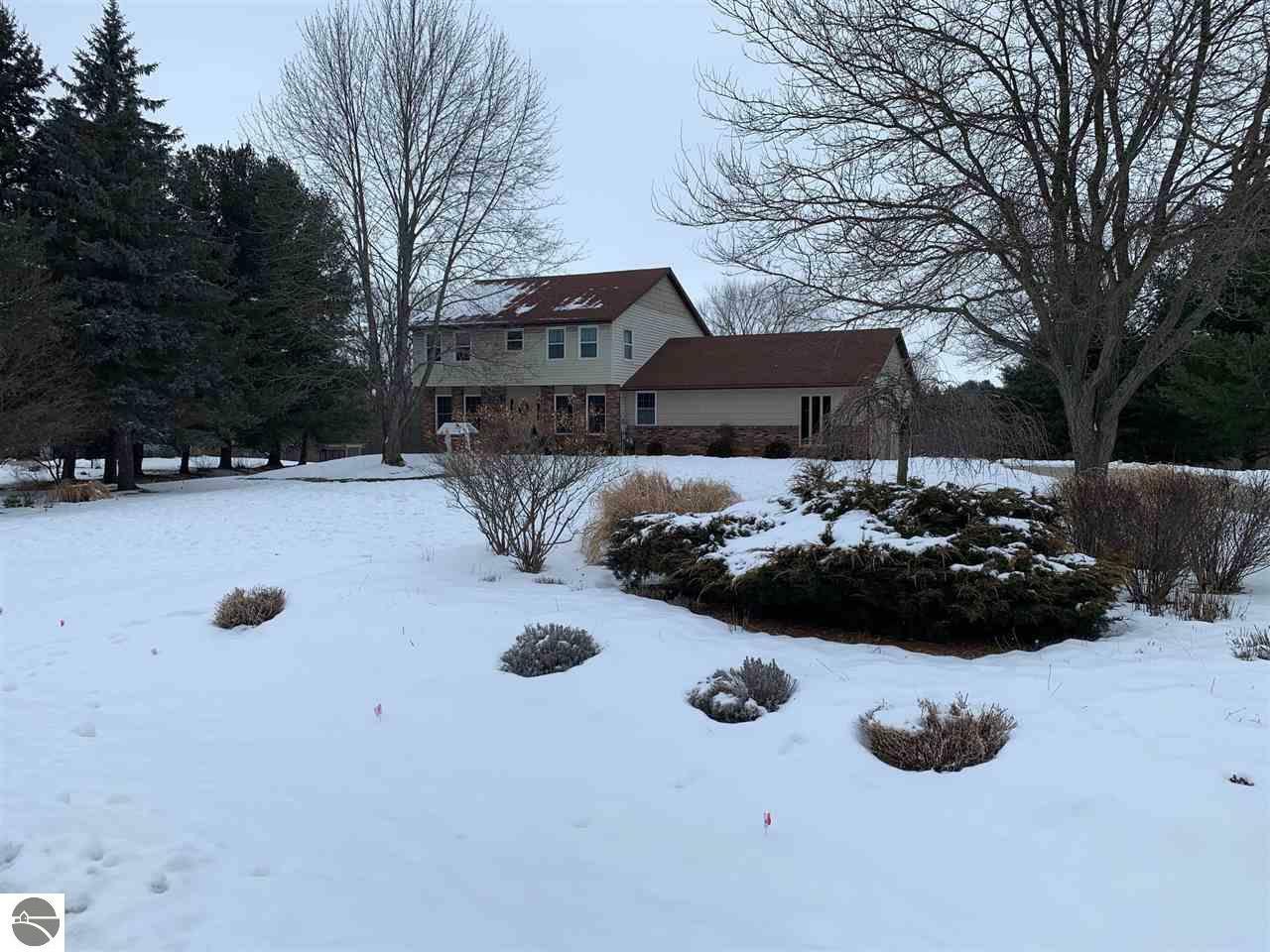 Property Photo:  202 Lantern Hill Drive  MI 48858 