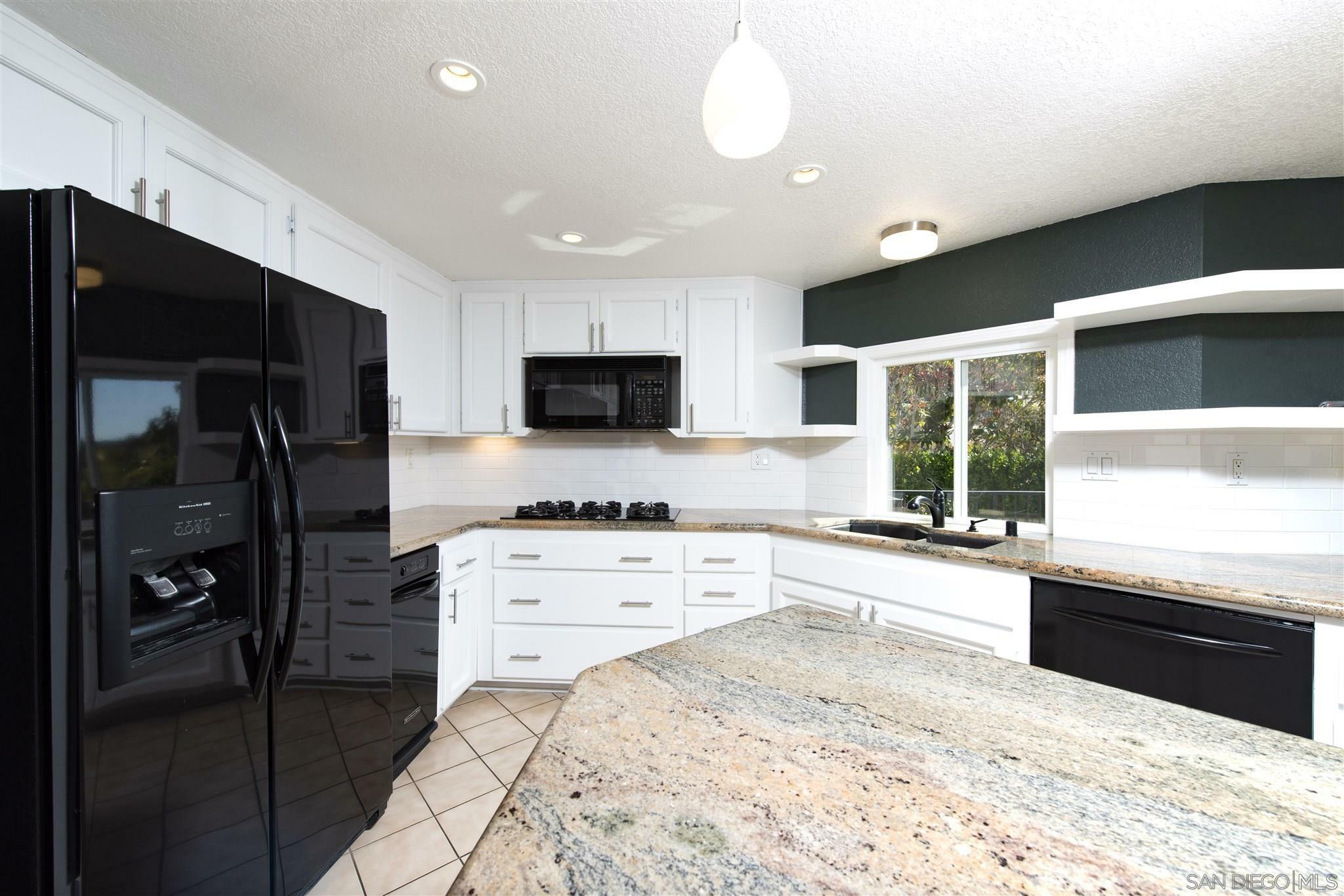 Property Photo:  4029 Vortex Pl  CA 92025 