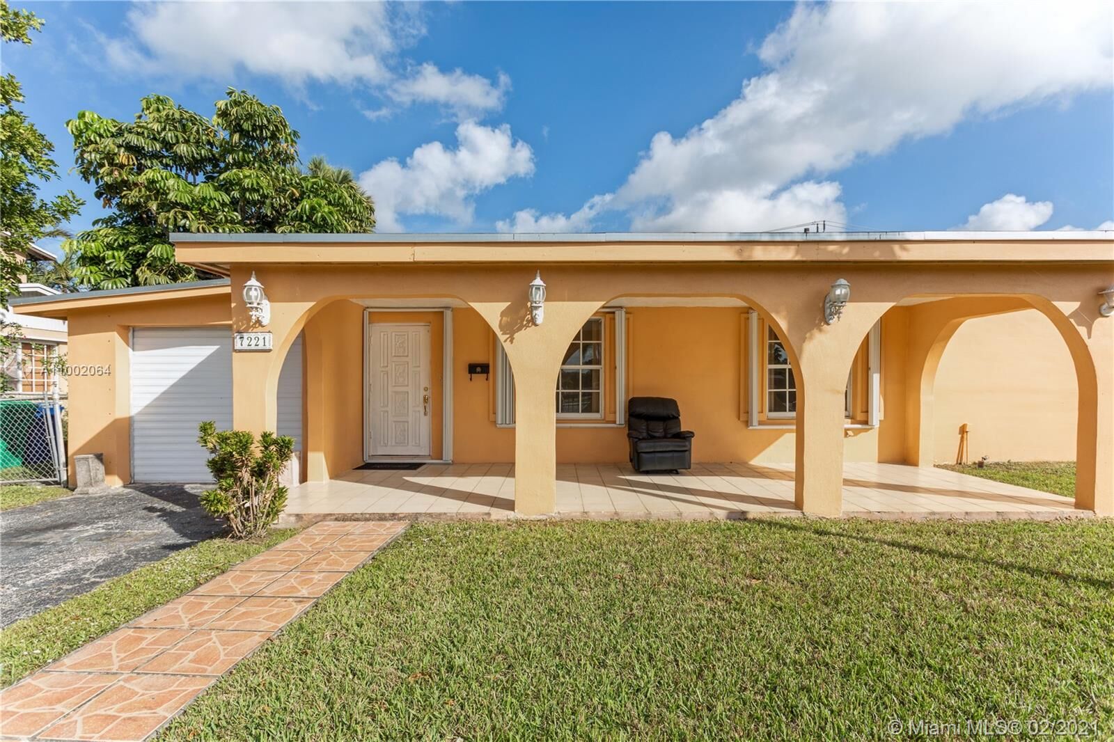 Property Photo: 7221 NW 169th St FL 33015