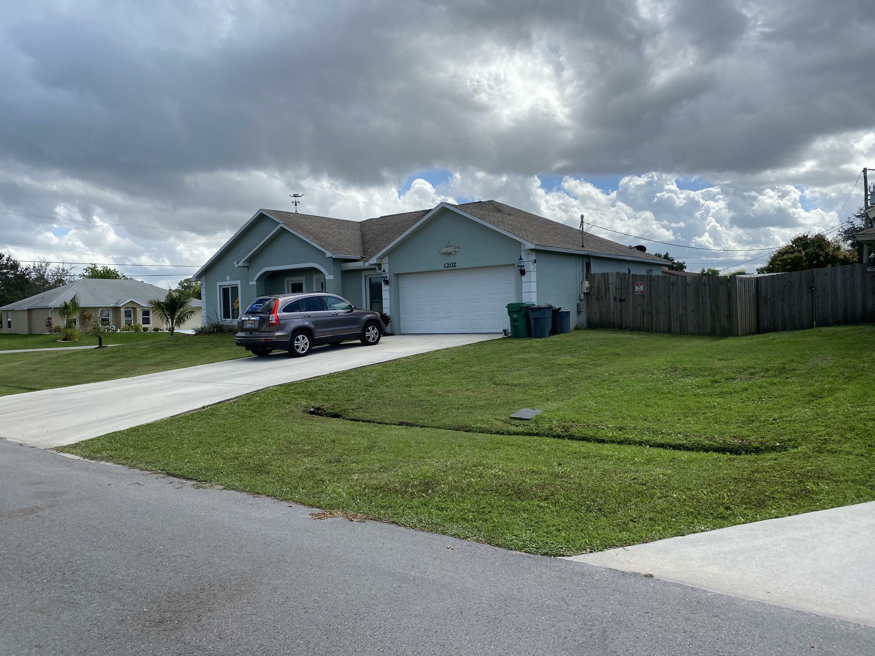 Property Photo:  1202 SW Albenga Avenue  FL 34953 