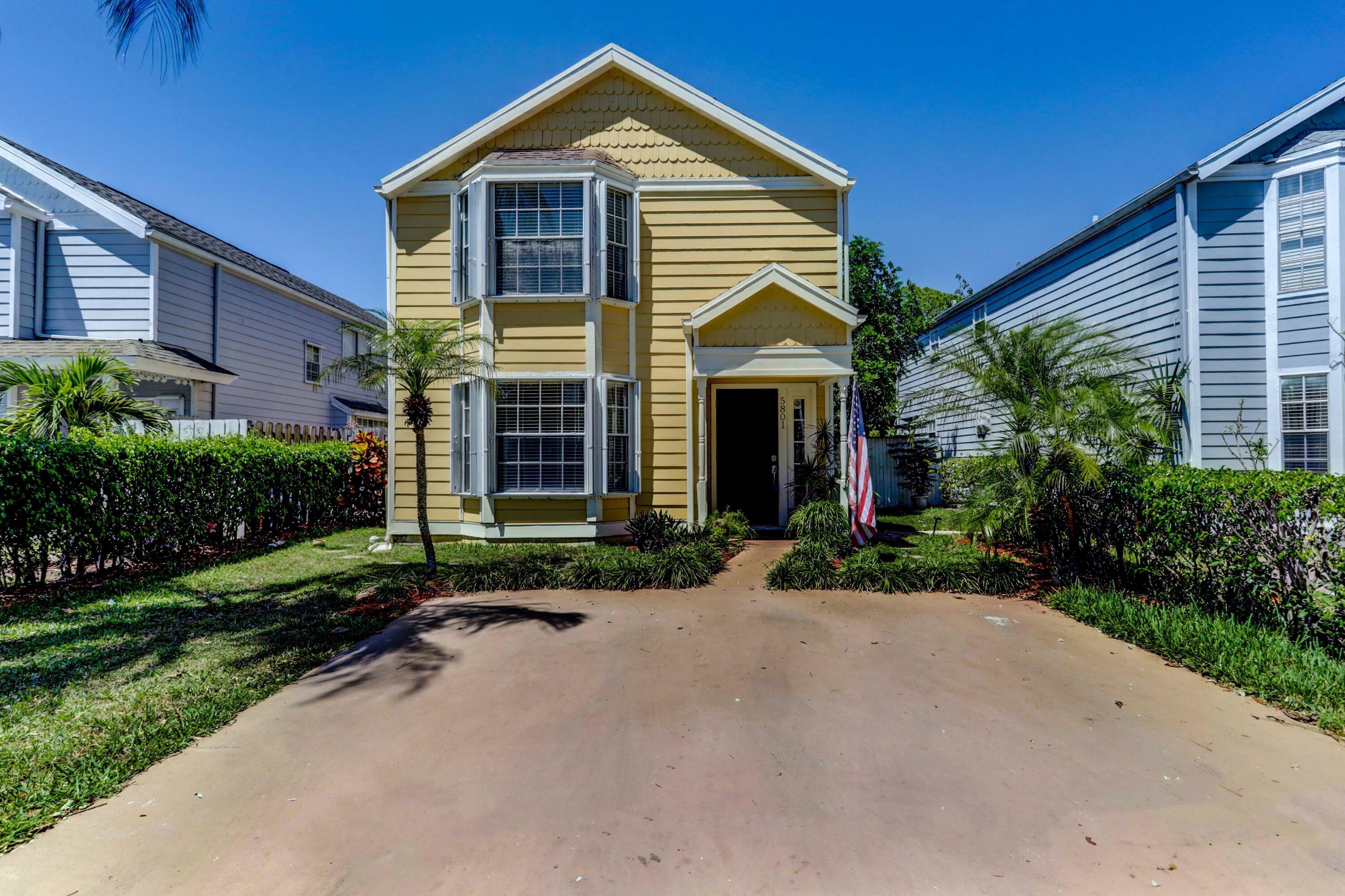 Property Photo: 5801 Dewberry Way FL 33415