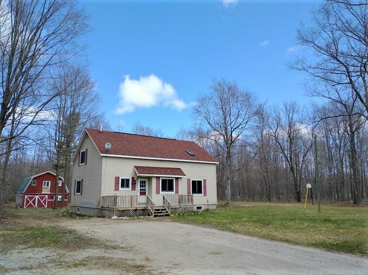 Property Photo:  614 W Devereaux Lake Road  MI 49749 