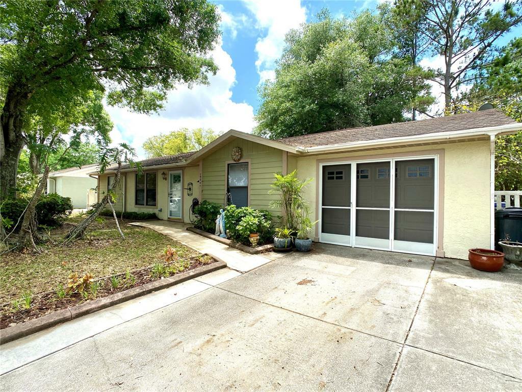 Property Photo: 8033 Banister Lane FL 34668