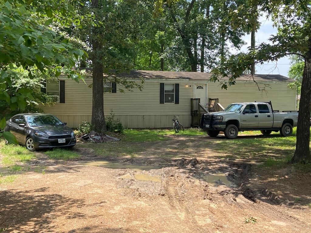 Property Photo: 109 County Road 3791 TX 77328